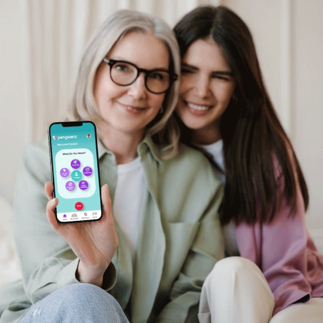 mother and daughter holding phone with picture of Pengwenz app on it.